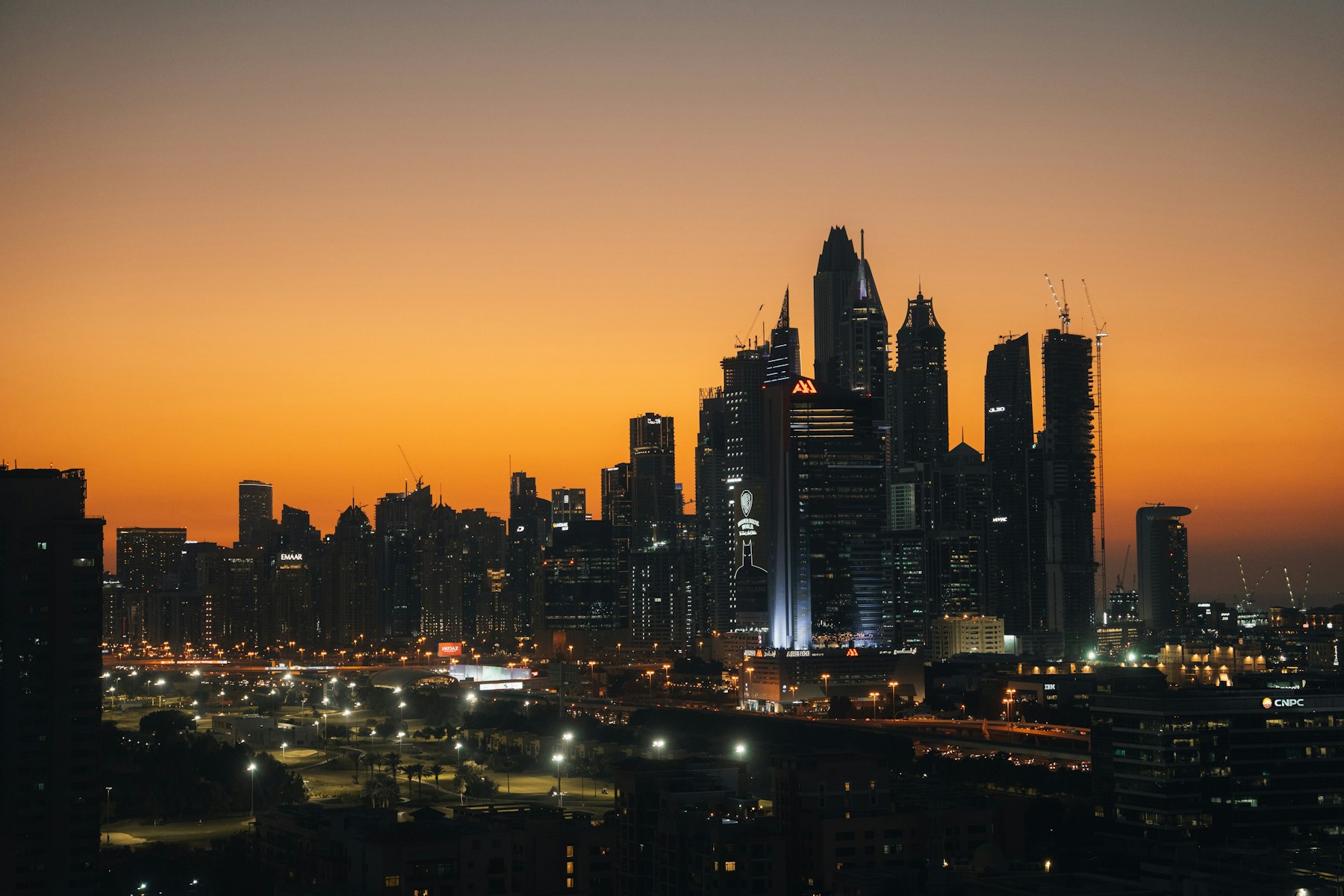 Dubai skyline with modern skyscrapers at sunset